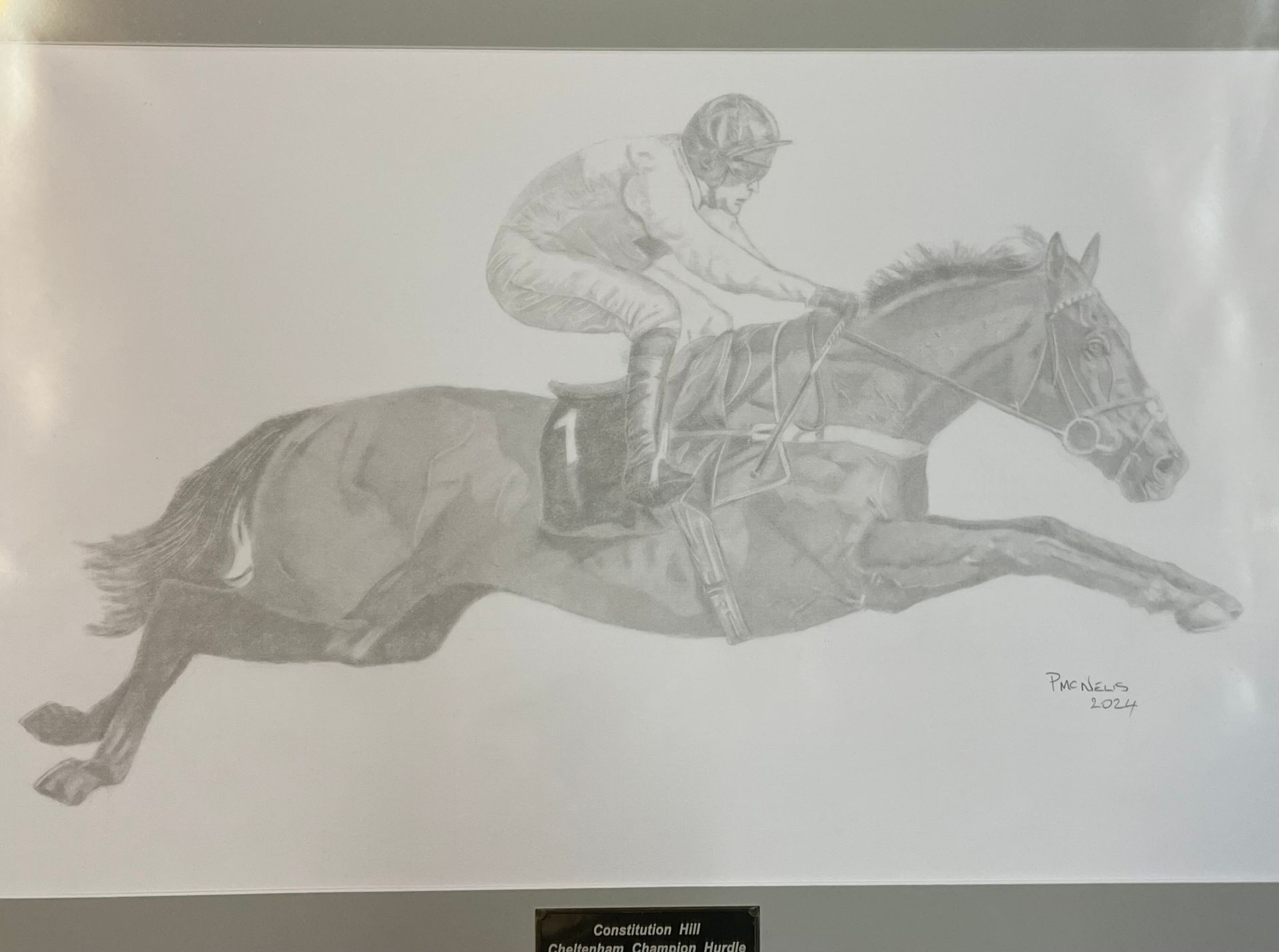 A black and white drawing of a jockey riding a horse.