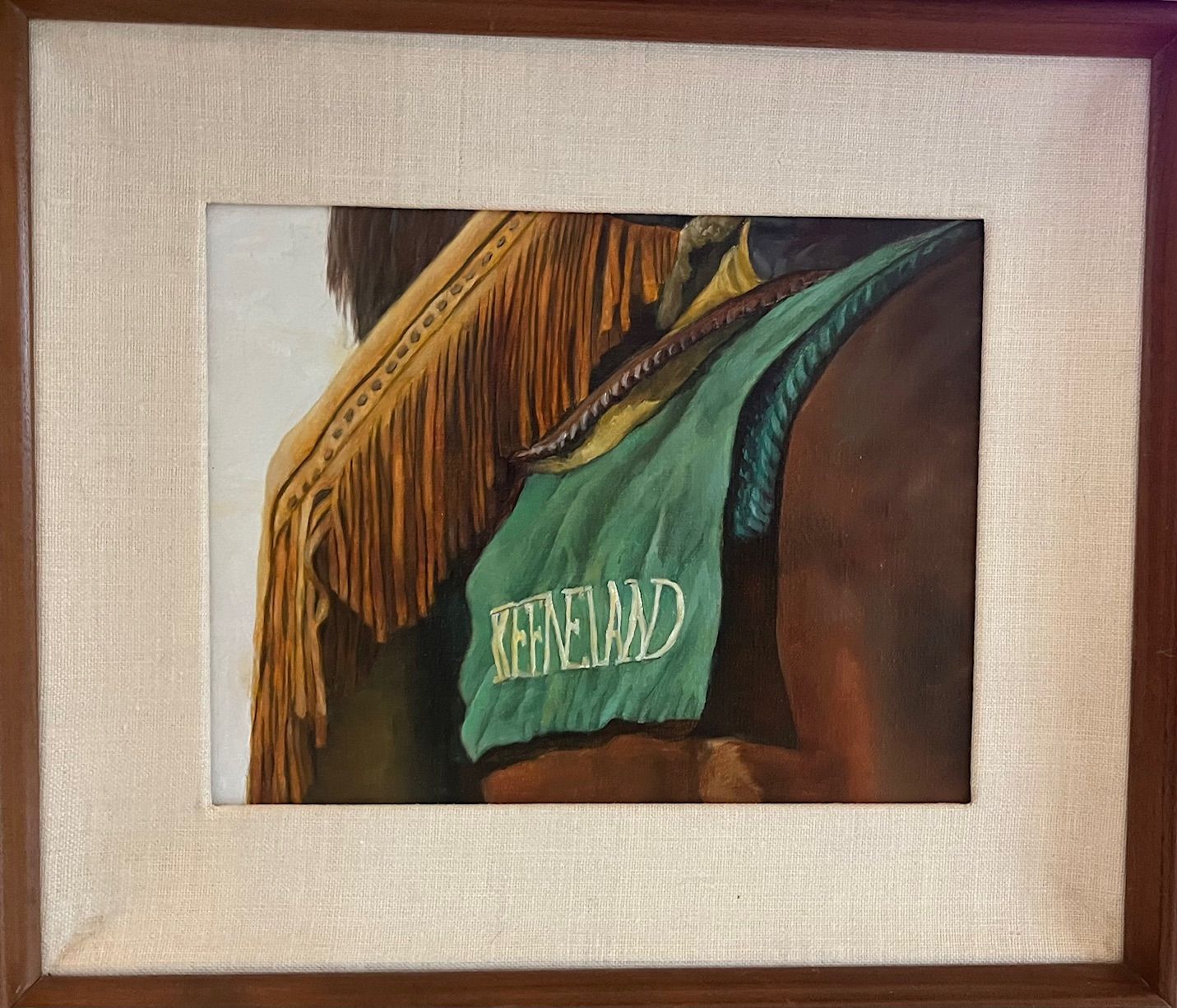 A painting of a horse with a green saddle cloth that says Keenland
