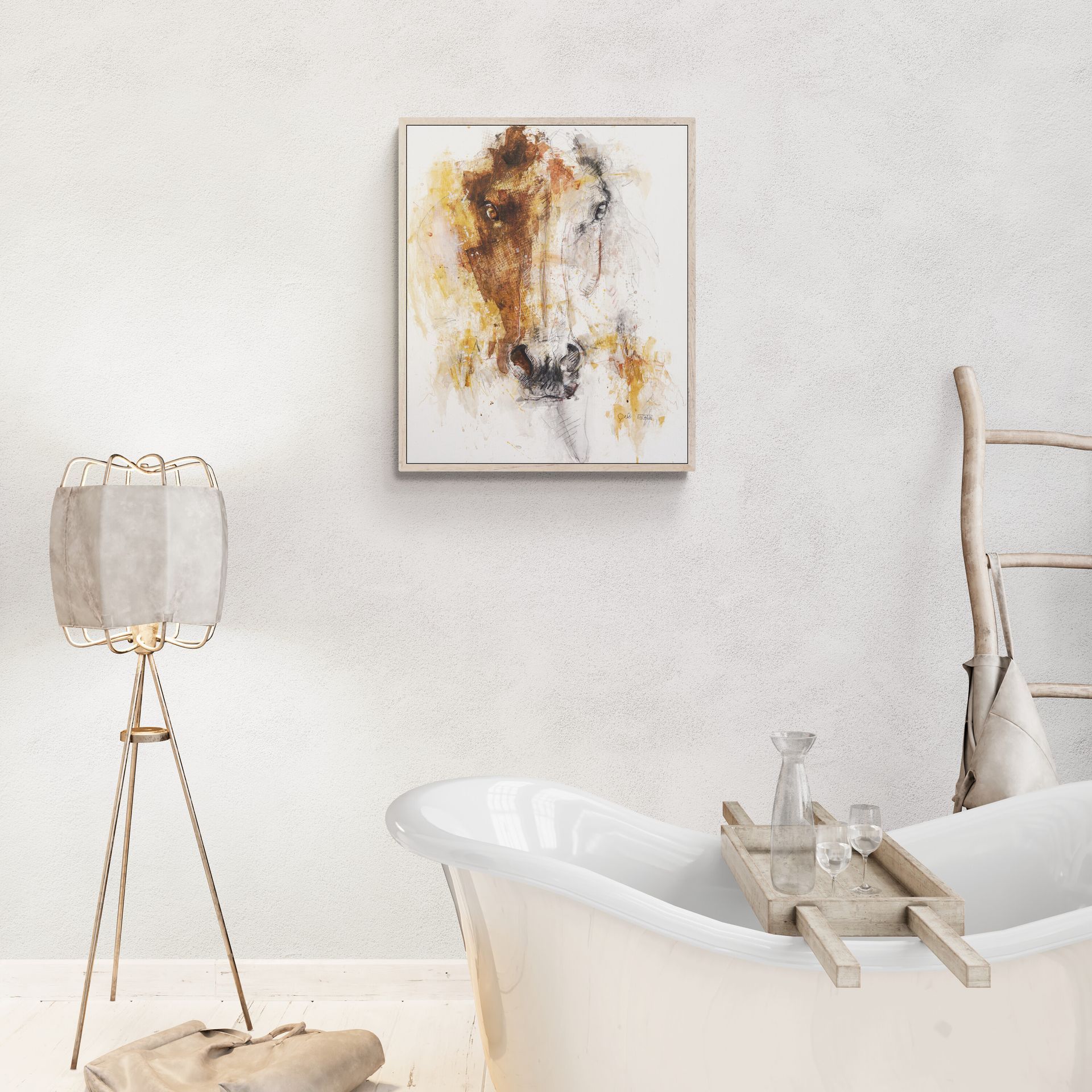 A bathtub in a bathroom with a painting on the wall above it