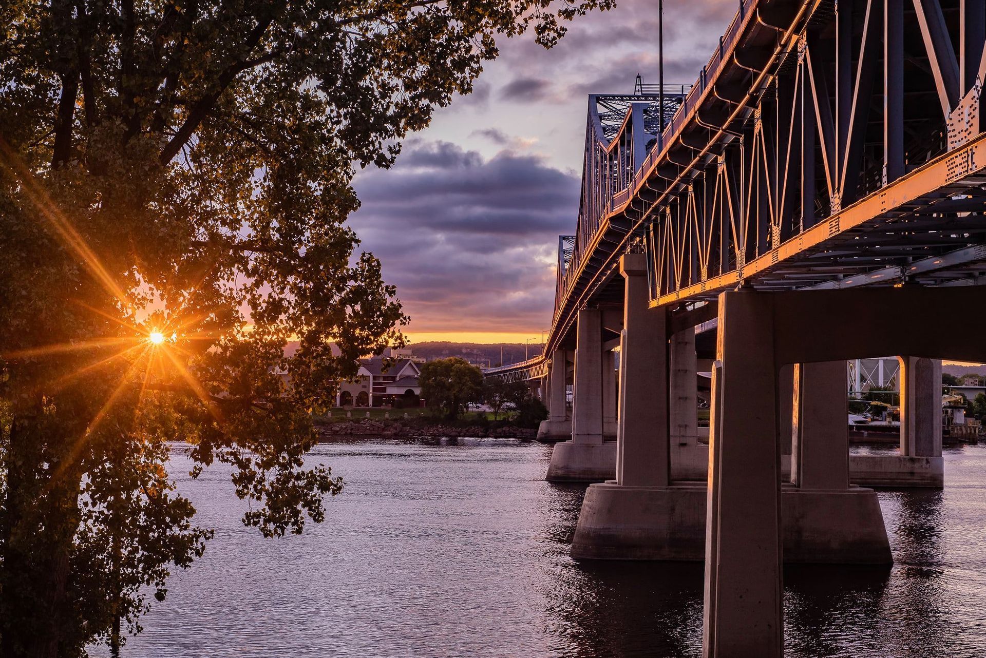La Crosse bridge over the Mississippi River at sunset, viewed from Pettibone Park; photo by Cfanta12, CC BY-SA 4.0