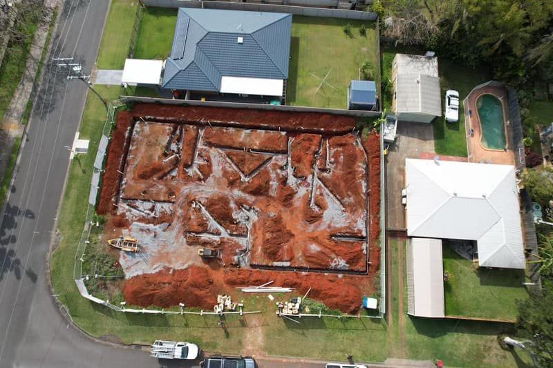 An Aerial View of a House Under Construction in a Residential Area — Beards Roofing and Plumbing in Kallangur, QLD