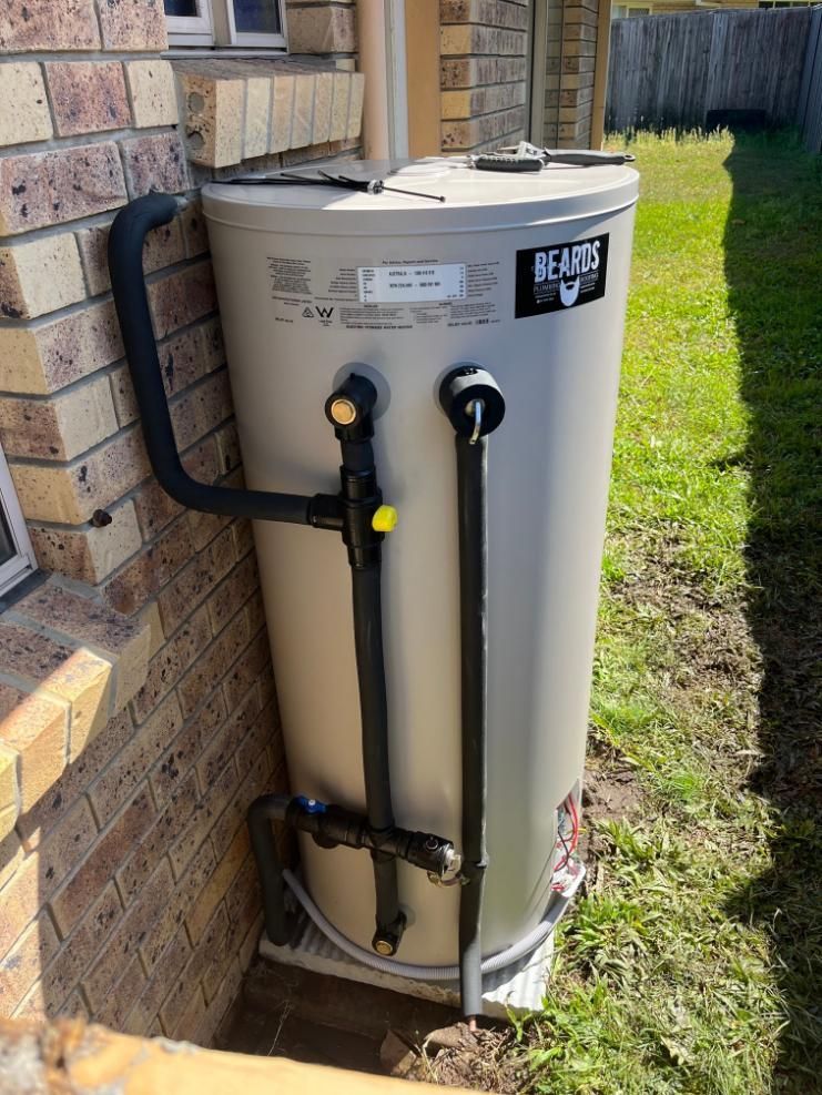 Water Heater is Sitting on the Side — Beards Roofing and Plumbing in Clontarf, QLD