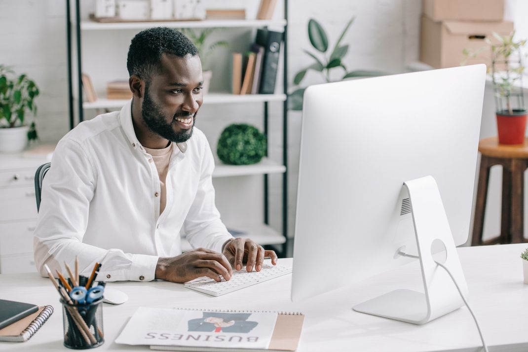Person typing at desk
