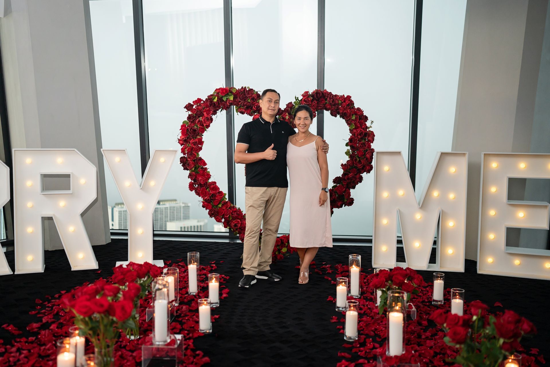 Man and woman pose near 