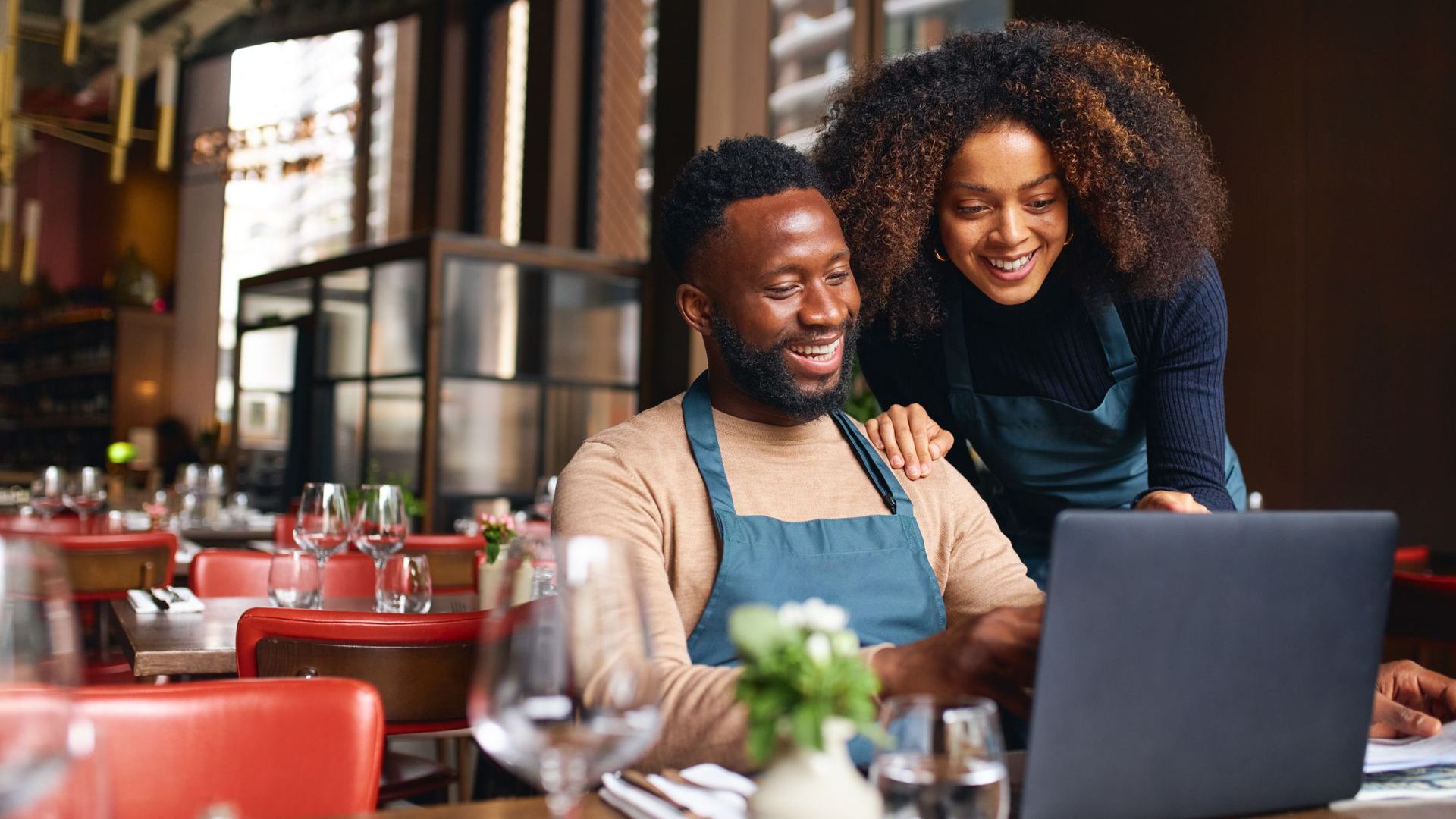 Couple signing first mortgage application