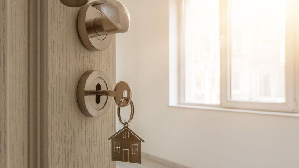Couple signing first mortgage application
