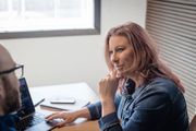woman listening intently to a client