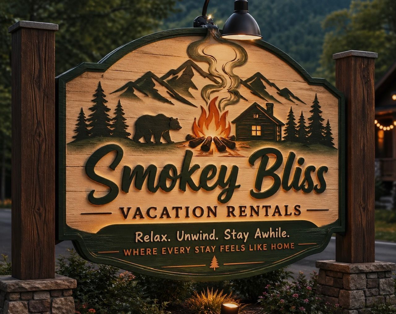Smokey Blus vacation rentals sign with mountains, pine trees, bear, cabin, and campfire at dusk