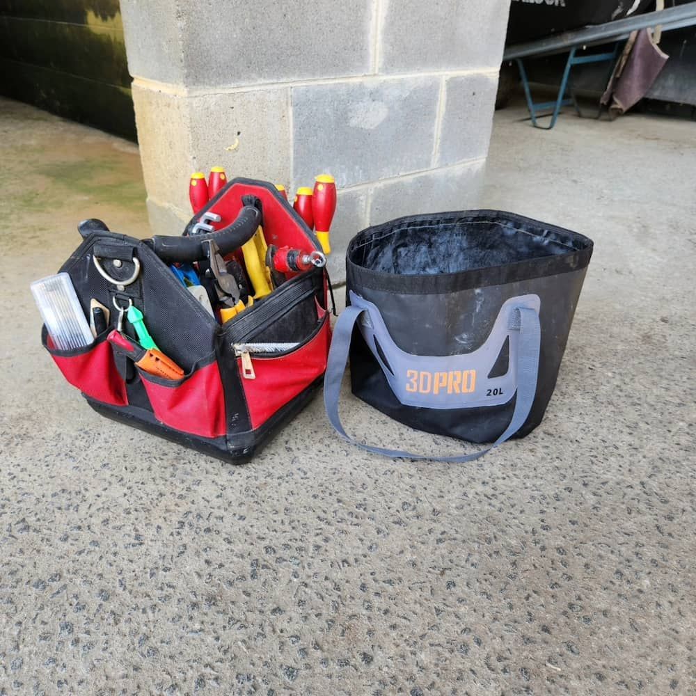 A Tool Bag For Electricians On A Floor — KARM Electrical Services In Medowie, NSW