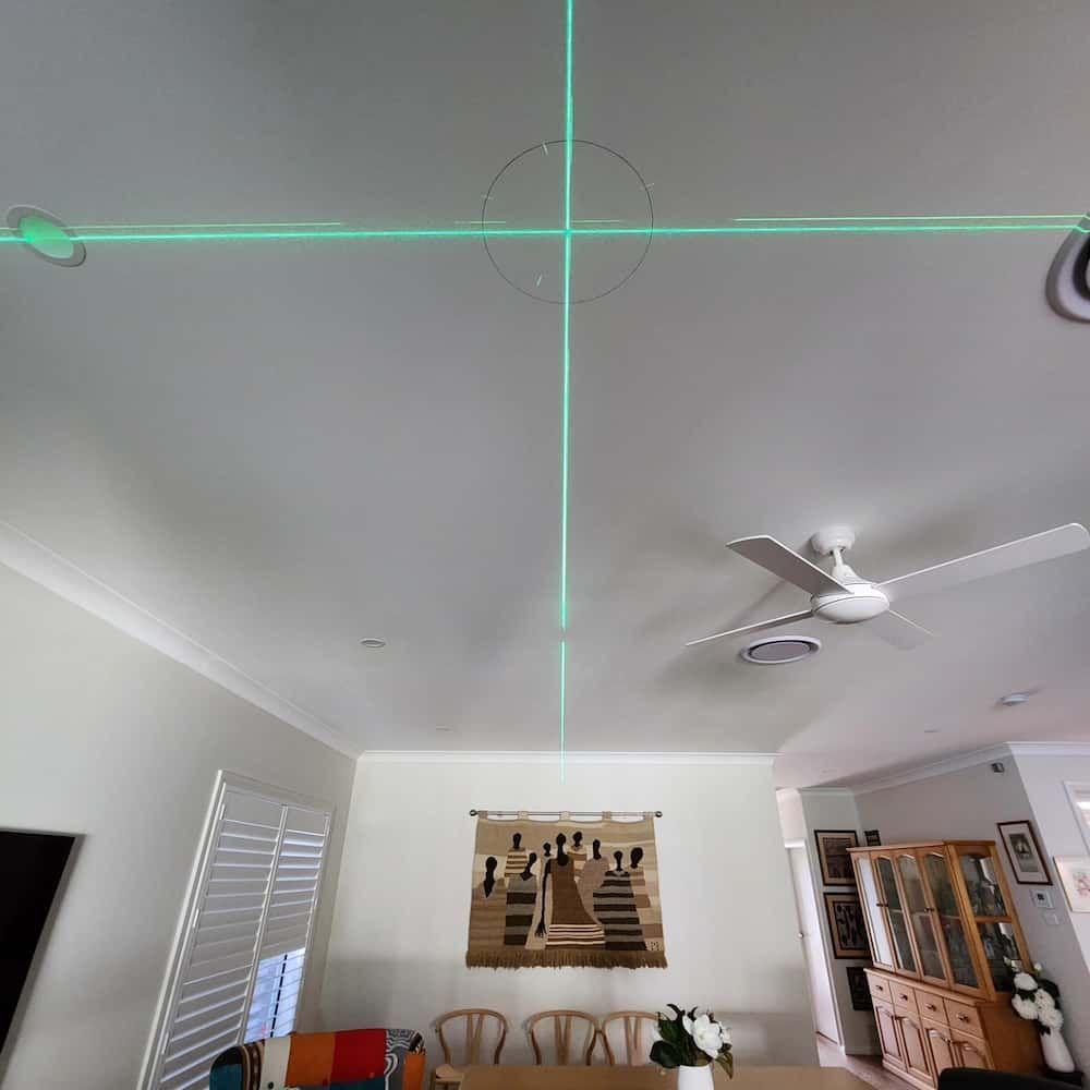 A Living Room With A Ceiling Fan And A Green Line On The Ceiling — KARM Electrical Services In Medowie, NSW