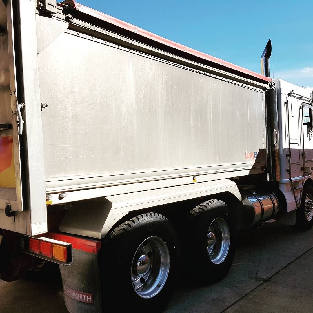 White Semi-trailer Truck With Chrome Wheels Parked — BOEX Tyres And Performance in Bowral, NSW