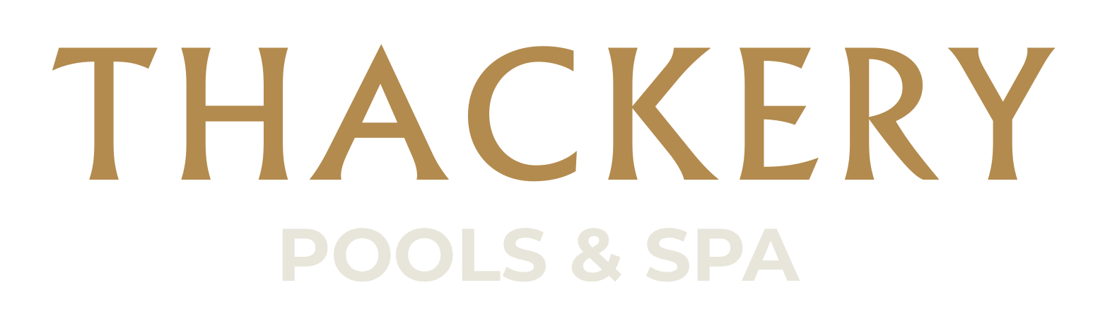 Thackery Pools & Spa logo in gold letters with a reflective shadow beneath it.