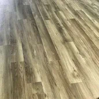 Wood-grain laminate flooring with light and dark brown planks