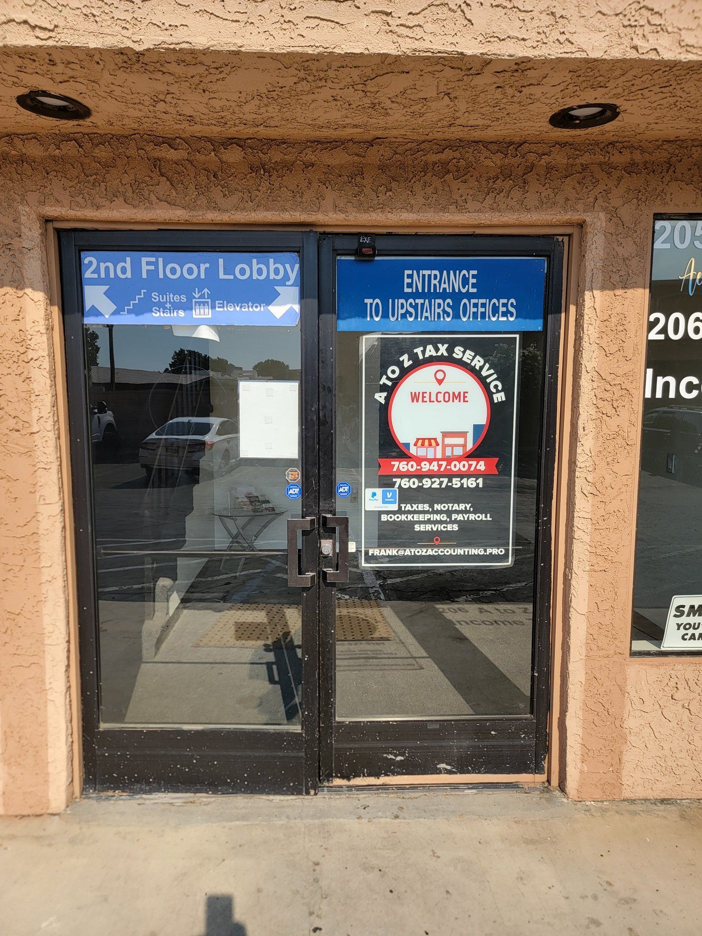 Aluminum and glass storefront entry doors installed by High Desert Window and Glass