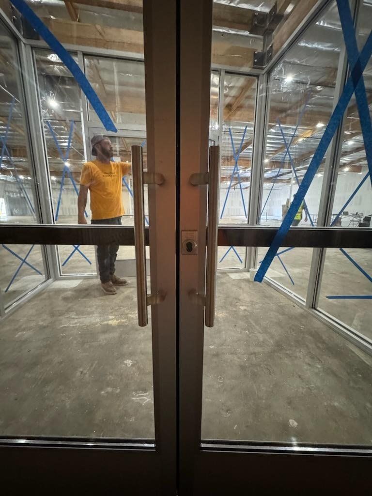 Commercial glass entry doors with ladder pulls installed by High Desert Window and Glass