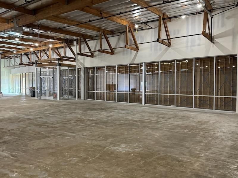 Commercial storefront glass wall installation in a warehouse build-out by High Desert Window and Glass