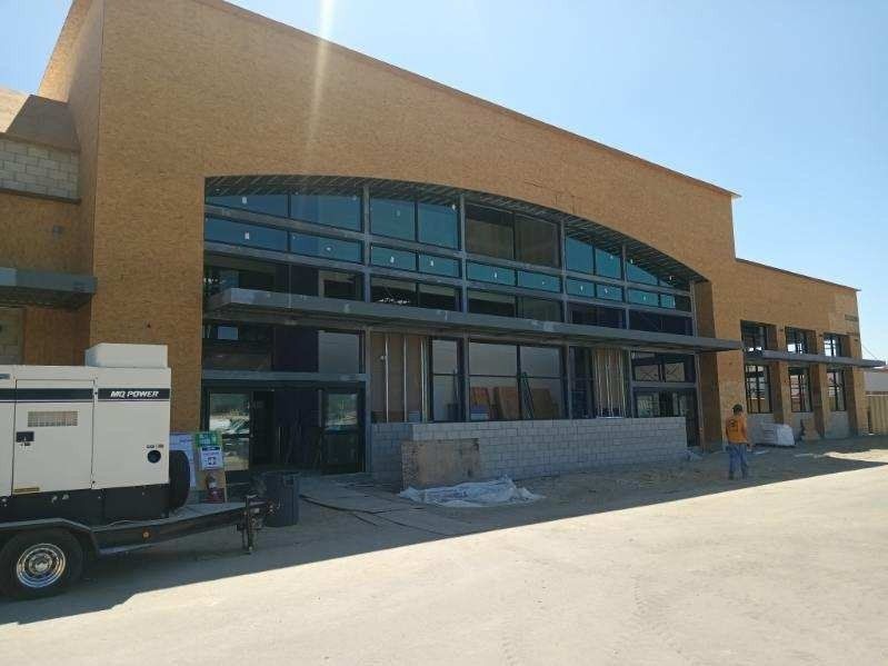 Commercial aluminum storefront windows on a new retail building by High Desert Window and Glass