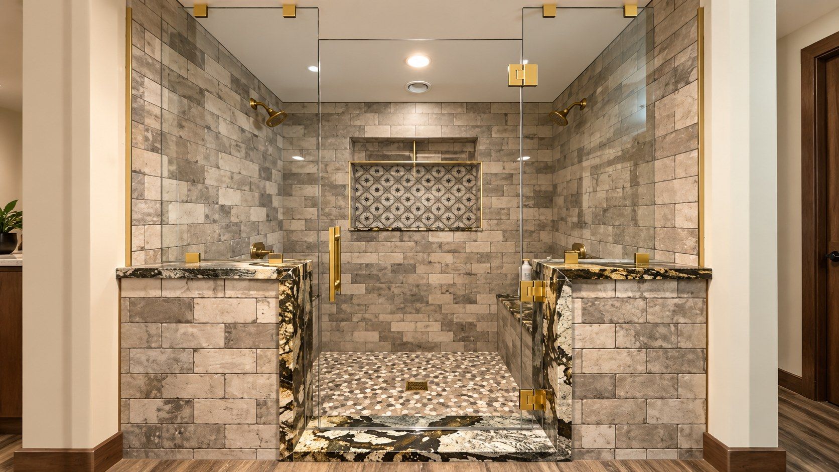 Luxury frameless walk-in glass shower with gold hardware and stone tile by High Desert Window and Glass