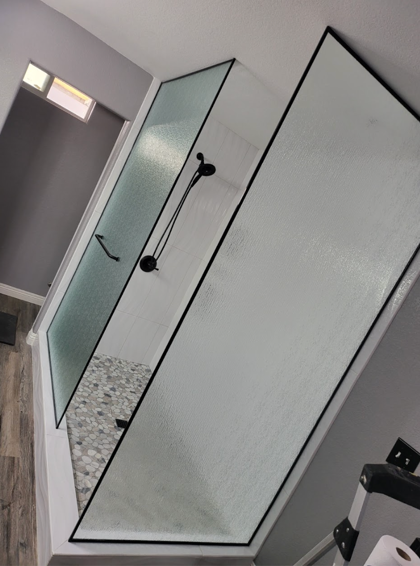 Frosted glass shower enclosure with black frame in Hesperia, CA