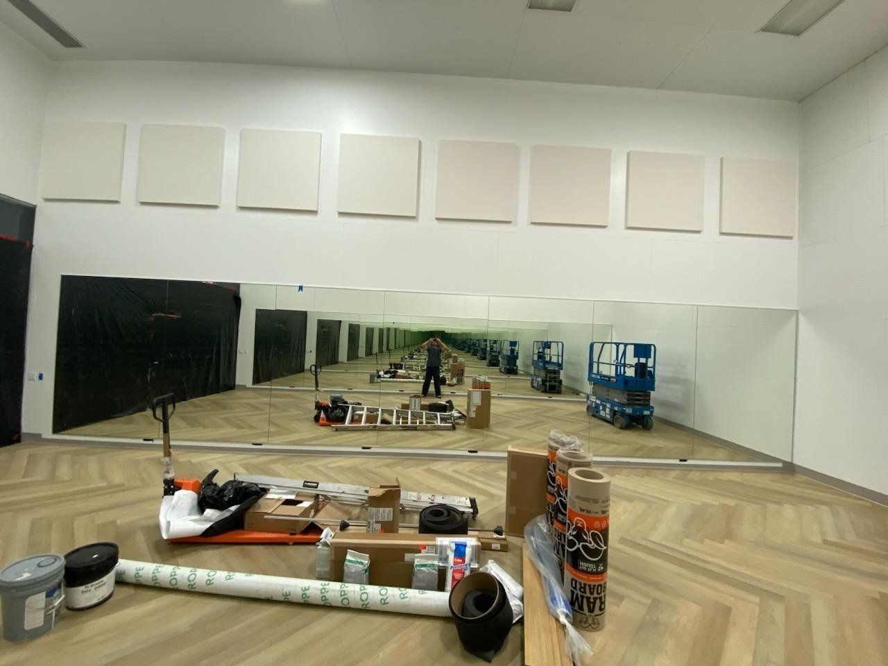Full wall custom mirrors installed in a fitness studio by High Desert Window and Glass