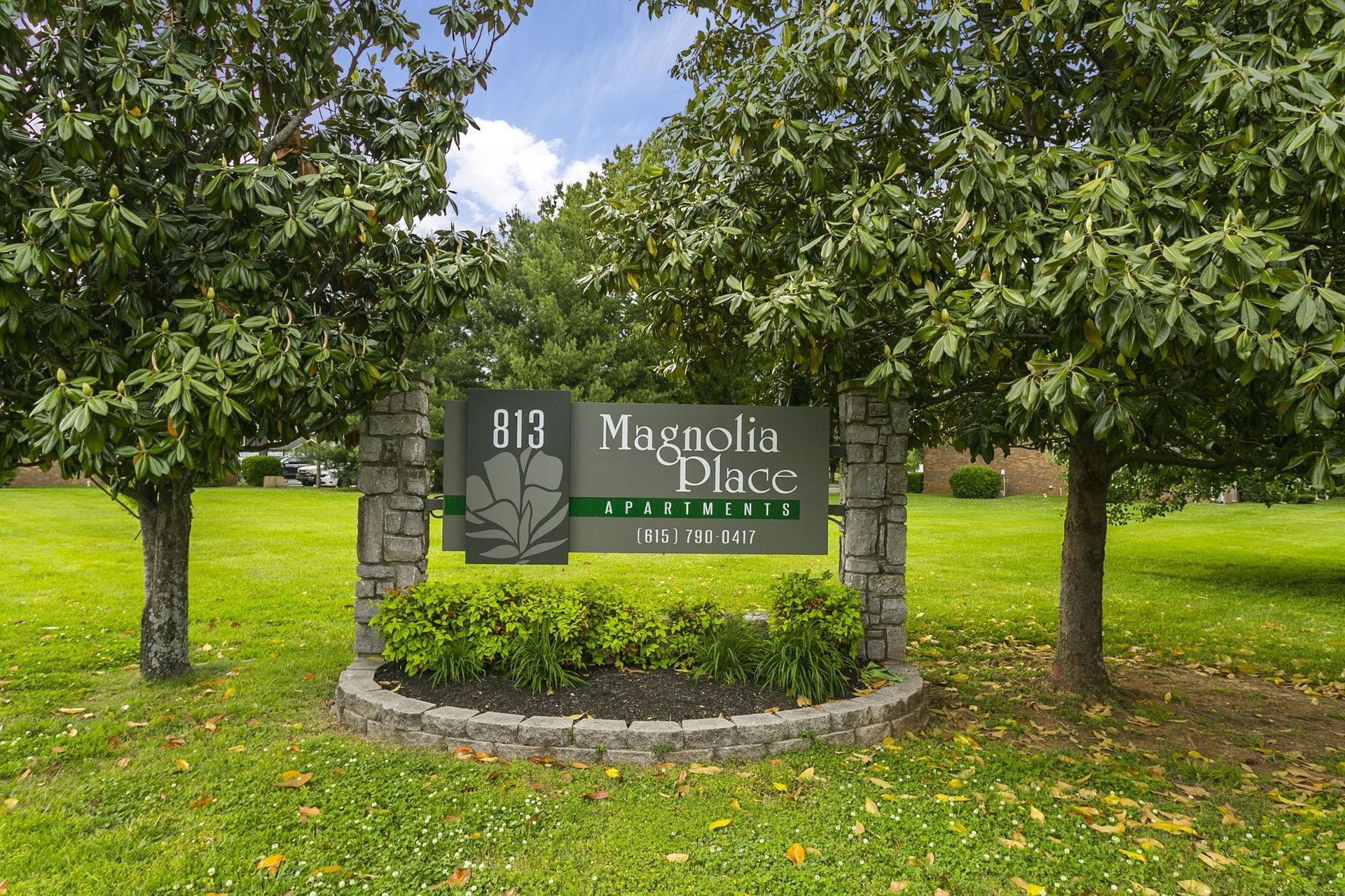A stone-based sign reading 