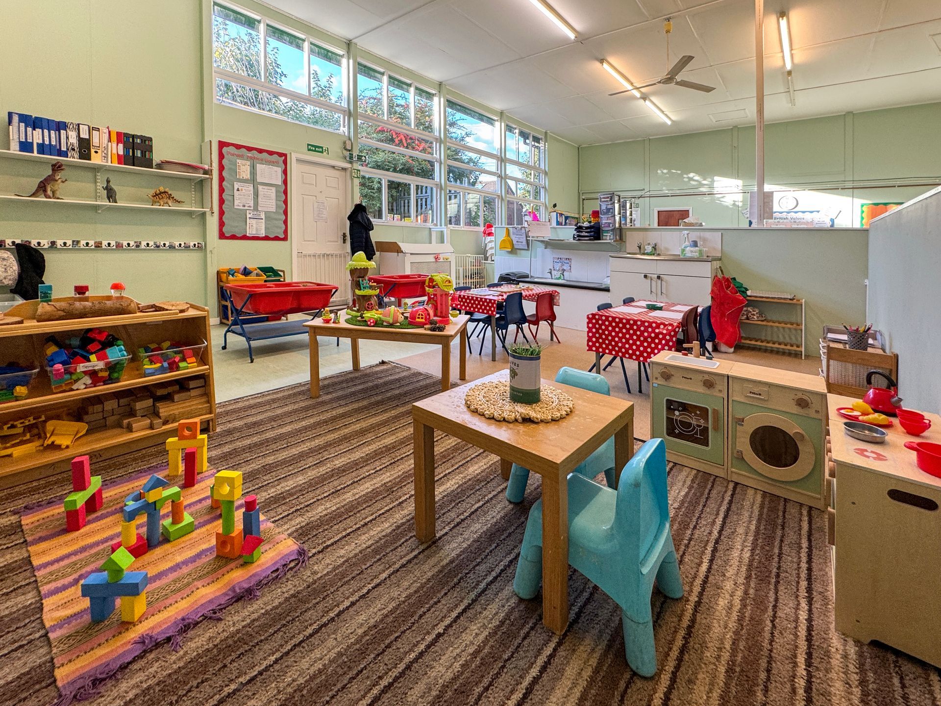 Bright nursery classroom with play and learning activities in Treeton