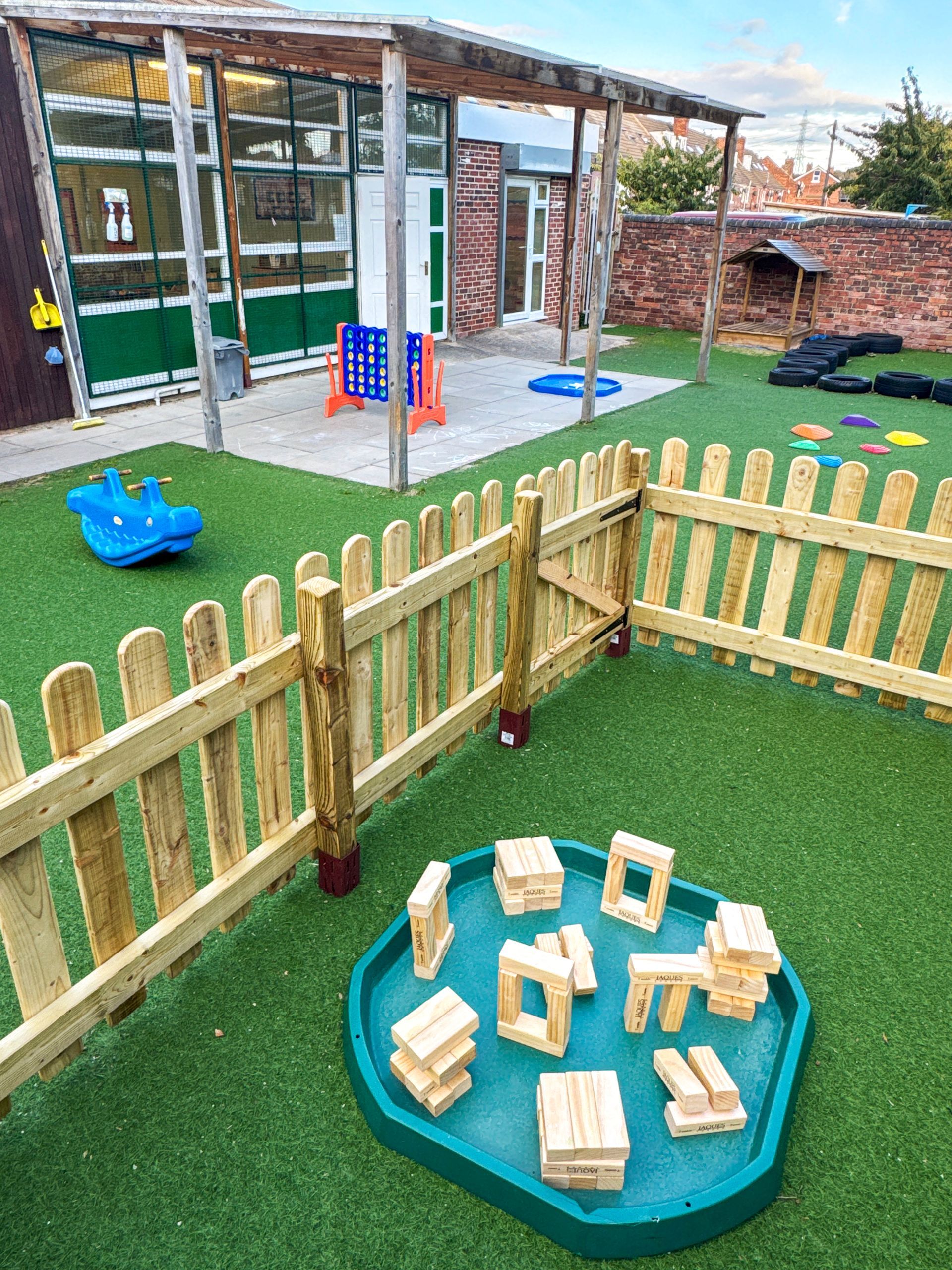 Outdoor play area at Railway Children Day Care in Treeton, Rotherham