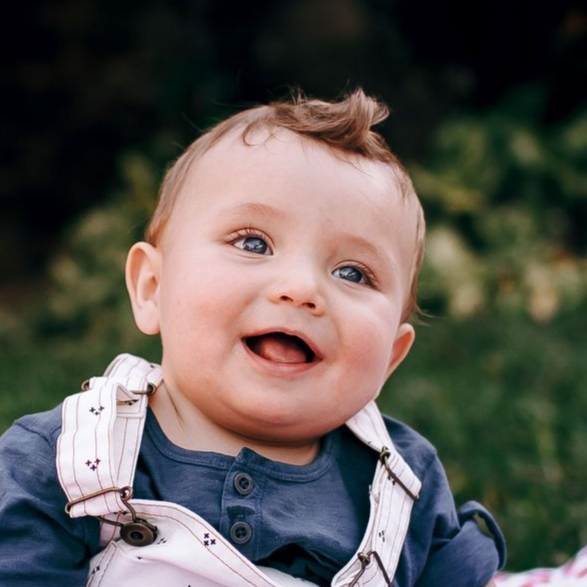 Smiling baby outdoors