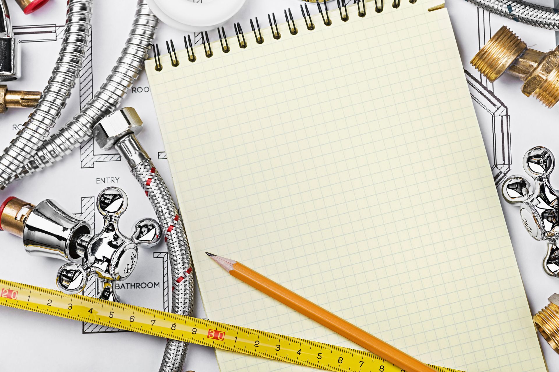 A notebook with a ruler and a pencil on it