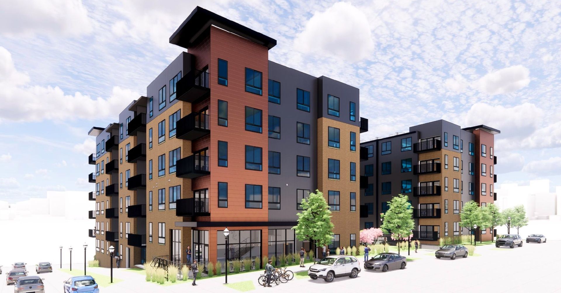 Modern multi-story apartment buildings with brick and gray facades, street trees, and parked cars under a cloudy sky