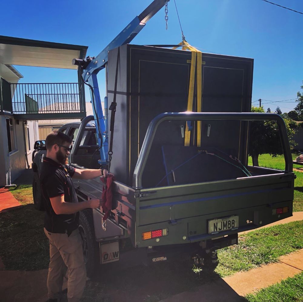 A Man Is Working in The Car — Toowoomba Locksmiths in Lockyer Valley, QLD