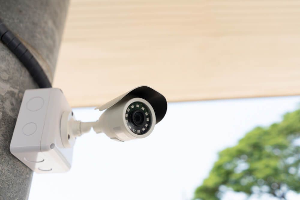 Security Camera Is Mounted to A Concrete Pole — Toowoomba Locksmiths in Toowoomba City, QLD
