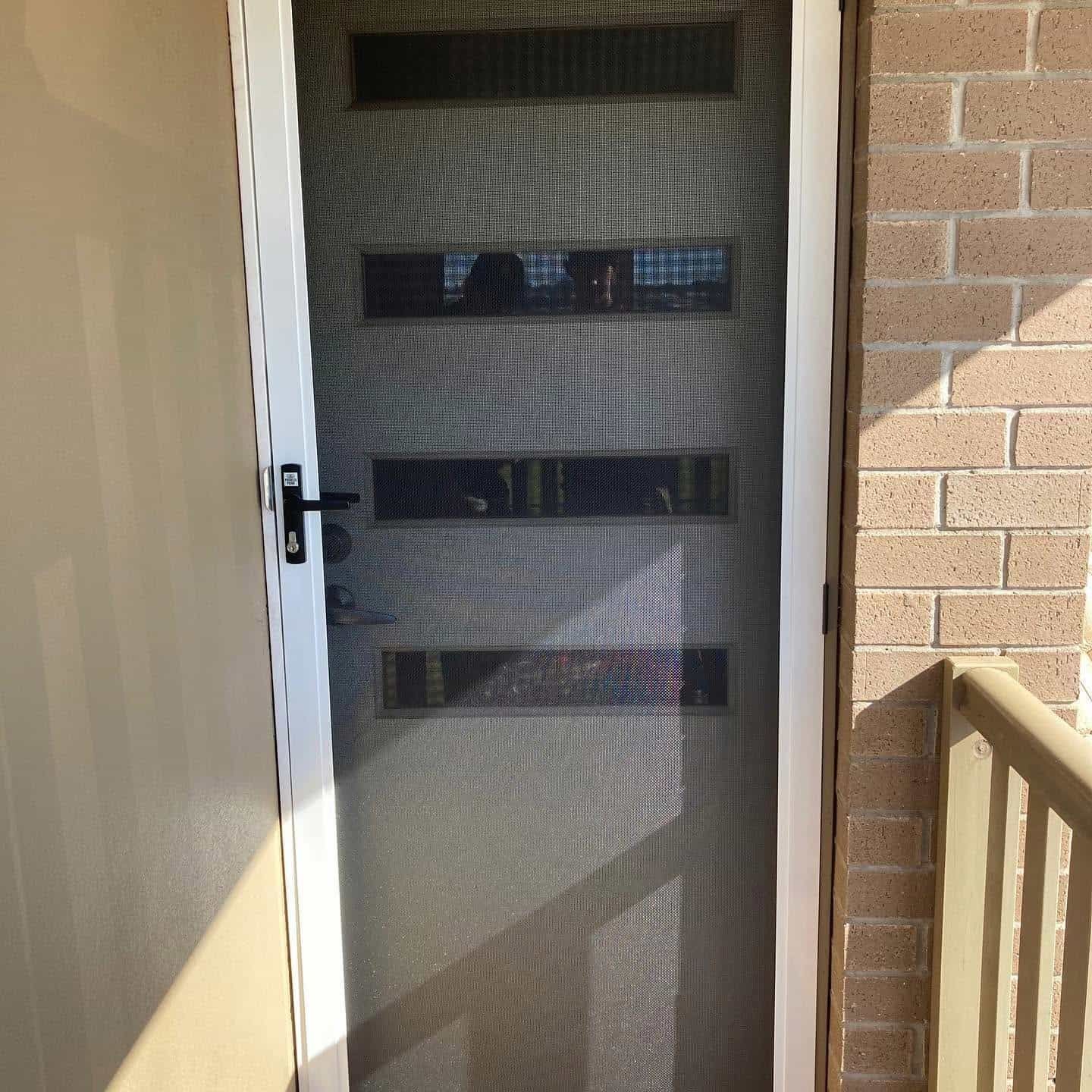 Open Screen Door With Frosted Glass Panels — Toowoomba Locksmiths in Toowoomba City, QLD