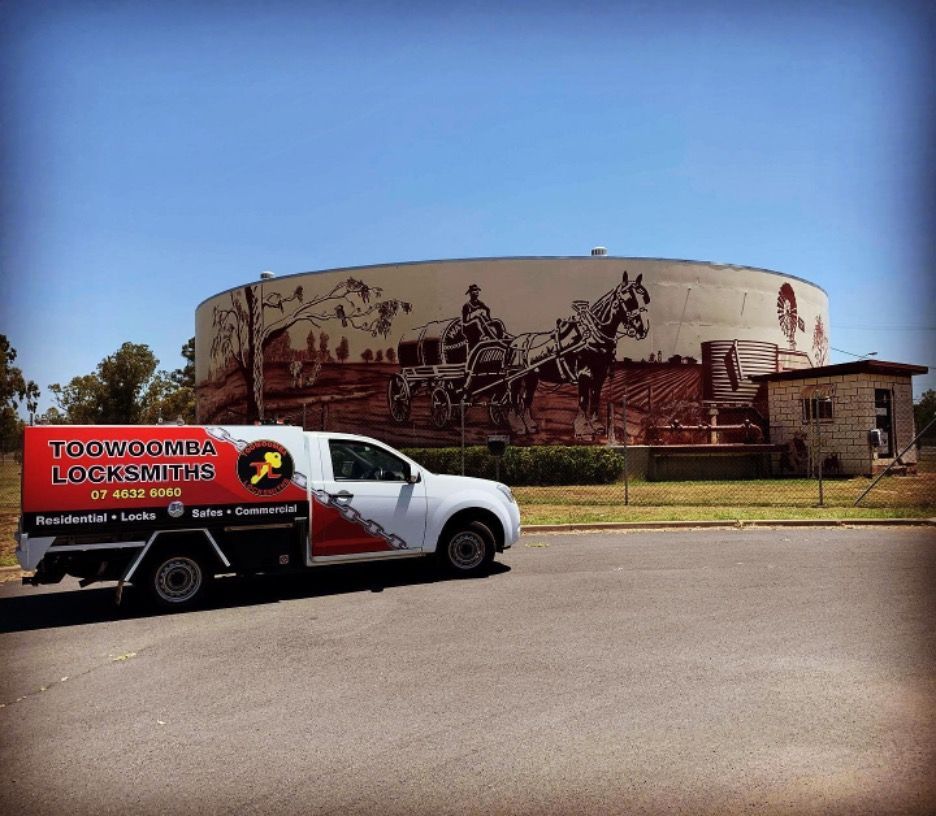 A White Truck Is Parked on The Side of The Road — Toowoomba Locksmiths in Toowoomba City, QLD