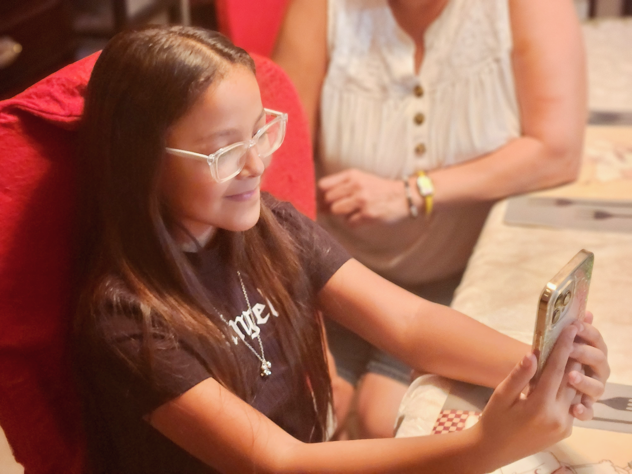 girl looking at phone