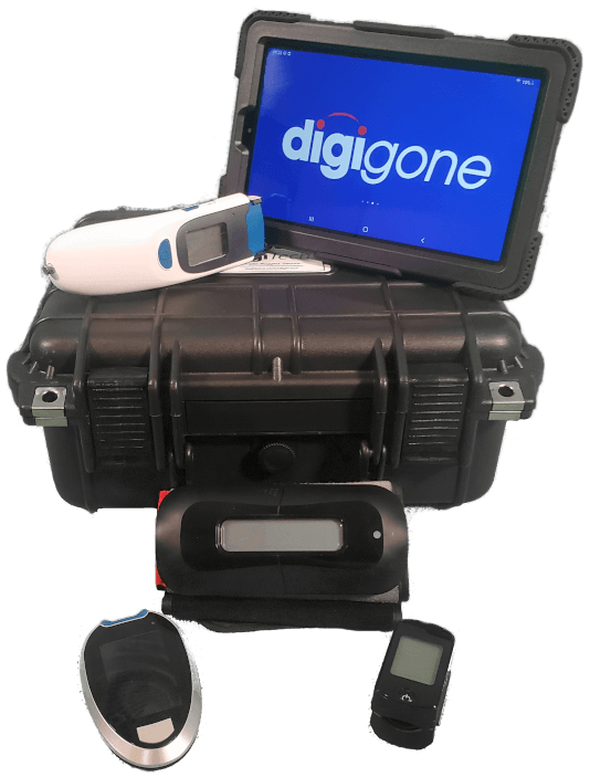 A photo of the digiMed kit with several medical devices visible. Atop the kit's case is the tablet and a wireless thermometer. In front of the case are a blood pressure cuff, a glucose meter and a pulse oximeter.