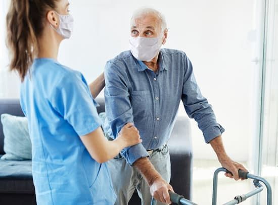 Photo of a nurse caring for a patient.