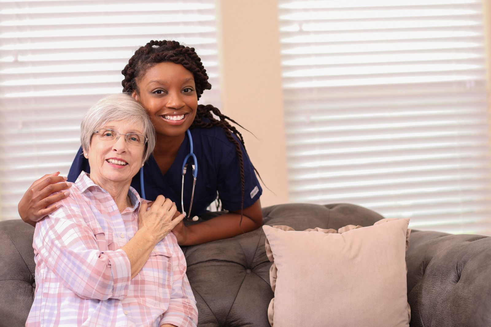 A picture of a doctor and patient together.