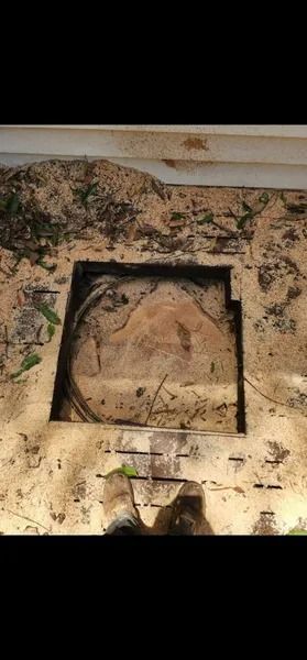 Small Square Niche in a Rough, Weathered Wall — Barlows Tree Services in Rockhampton, QLD
