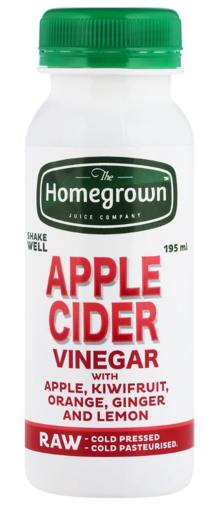 Homegrown apple cider vinegar bottle with green cap and label listing apple, kiwi, orange, ginger, and lemon balm