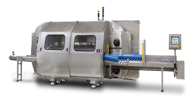 Industrial food-processing machine with stainless steel body and blue conveyor on white background