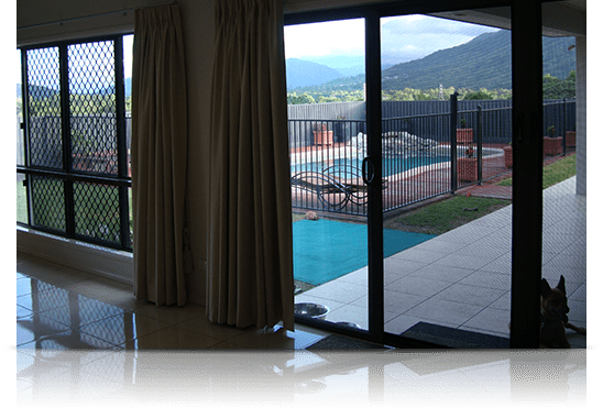 Sliding Glass  Door With Curtain - Security Fitters in Cairns, QLD