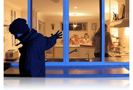 Man Touching The Glass Window - Security Fitters in Cairns, QLD