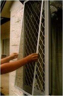 Installing Glass Window - Security Fitters in Cairns, QLD
