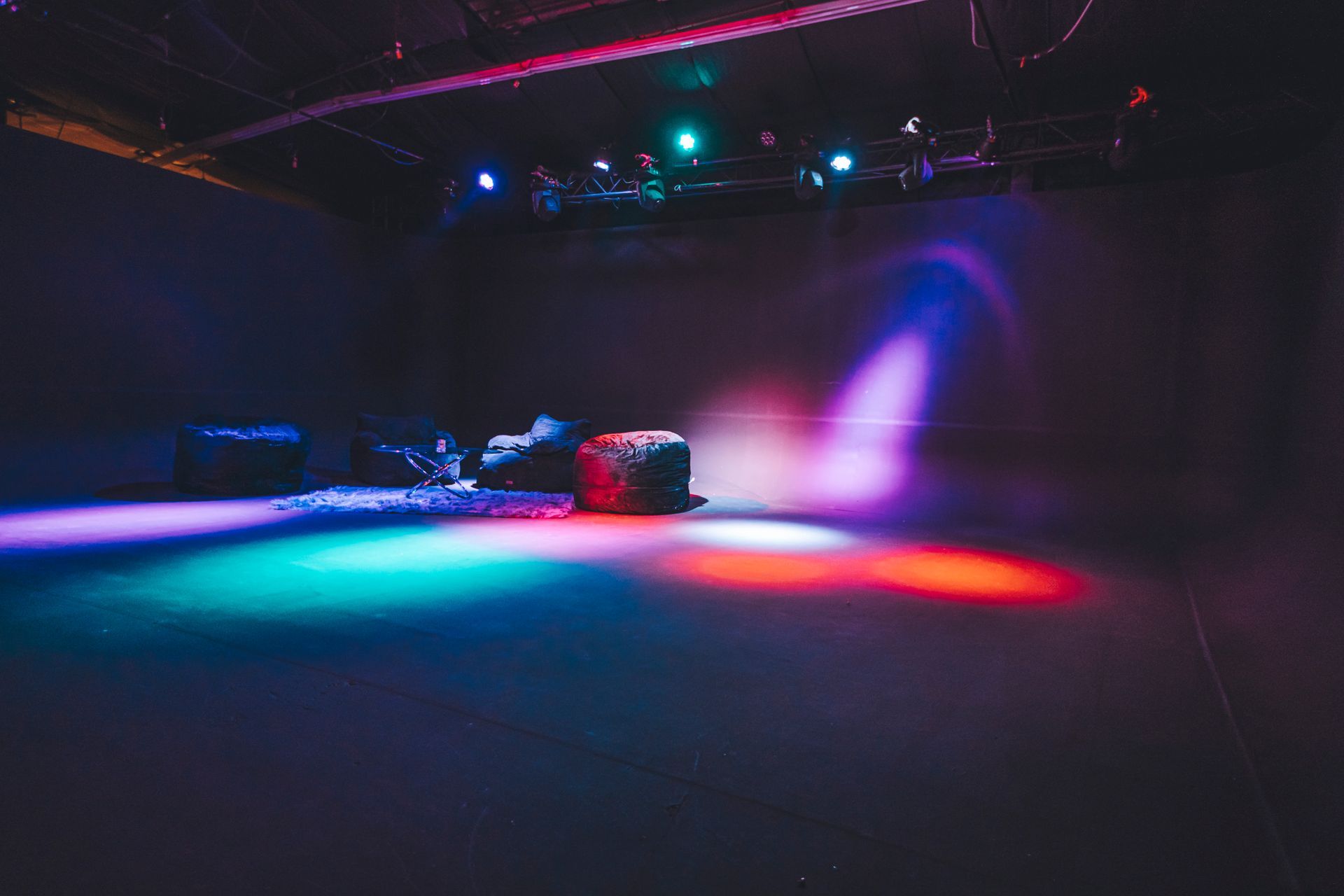 A dark room with a lot of lights on it.