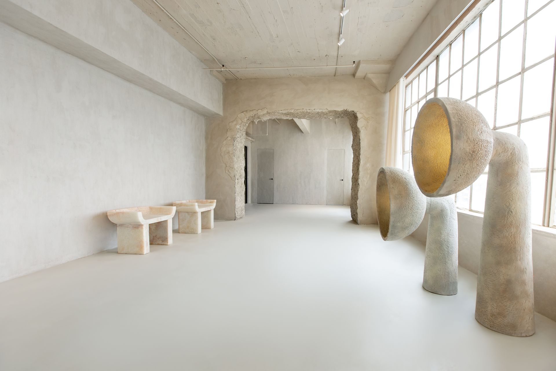 There are a lot of sculptures in this room.
