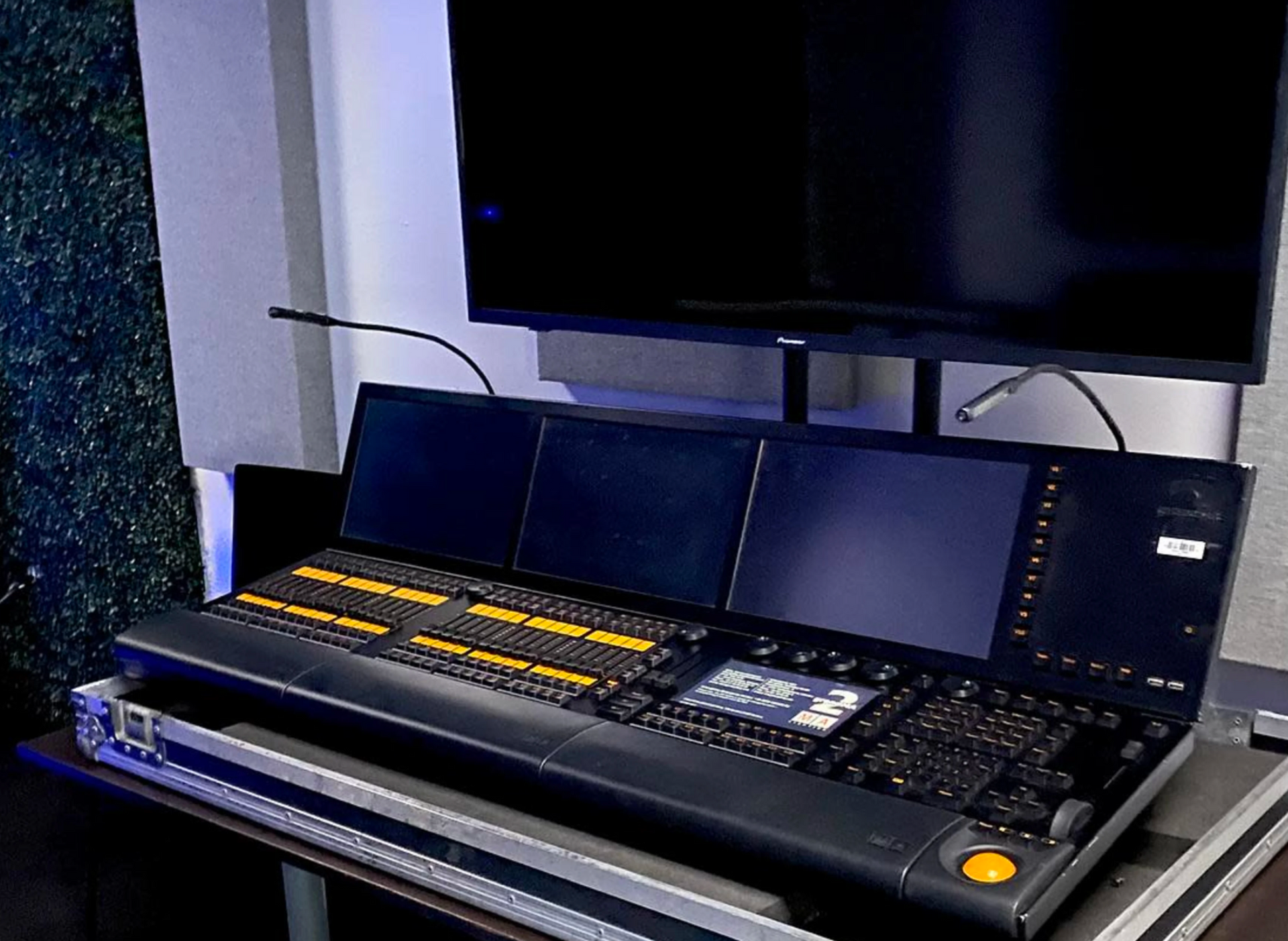 A computer monitor is sitting on top of a keyboard