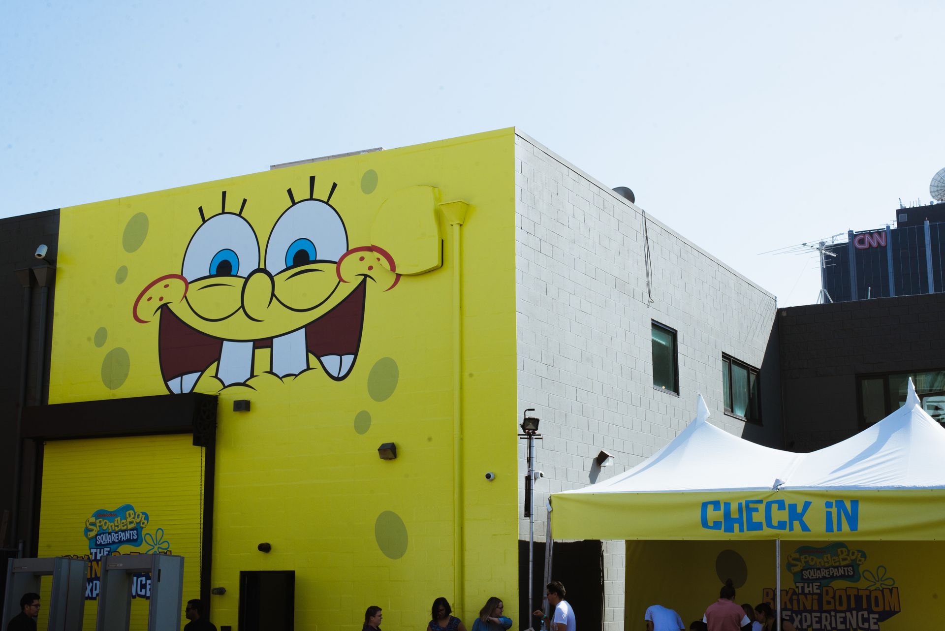 SpongeBob SquarePants painted on a yellow building next to a 