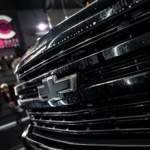 A close up of the front grille of a chevrolet truck.