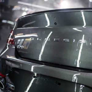 A close up of the rear end of a genesis car.